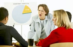 Negative person around others in a meeting_relationshipcoach.co.uk.png